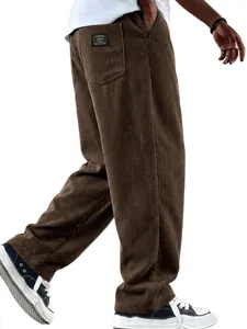 Men's brown corduroy straight leg casual pants, loose fit winter trousers detailing.