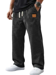 Men waffle knit casual pants detail showing straight leg cut and comfortable drawstring waist.