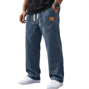 Men's casual waffle straight pants with drawstring and pocket patch for autumn winter.
