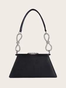 Schwarze Satin Abendtasche mit glitzernden Strassgriffen und edlem Kristallverschluss.