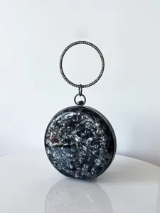 Elegante schwarze runde Abendtasche mit Strass-Ringgriff und metallischem Rahmen.