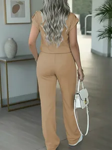 Detailed back view of a solid color short sleeve top and straight leg casual pants set.