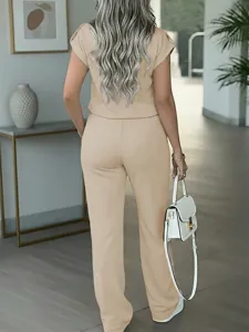 Chic casual two-piece pants set for women featuring a solid short-sleeve top and wide-leg trousers.