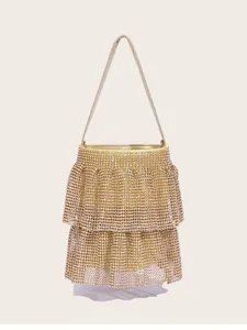 Glänzende goldene Strass-Stufen-Eimerhandtasche Detailansicht für elegante Abendparty.