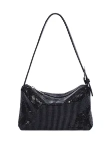 Detailansicht der schwarzen Pailletten-Netz-Schultertasche mit elegantem Lederriemen.