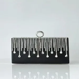Close-up of sparkling rhinestone fringe and elegant ring clasp on the luxurious black evening bag.