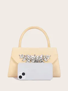 Elegante beige Abendhandtasche mit funkelndem Kristallbesatz für elegante festliche Anlässe.