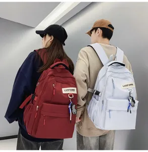 Sac à dos couple décontracté grande capacité sac d'école étudiant élégant sac de campus