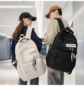 Sac à dos couple grande capacité minimaliste style collège cartable pour tous les jours.