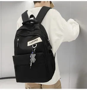Sac à dos noir simple pour hommes et femmes, grande capacité, sac d'école décontracté.