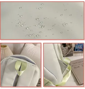 Grüner Rucksack Detailansicht mit wasserdichtem Stoff, stabilem Griff und Seitenriemen.