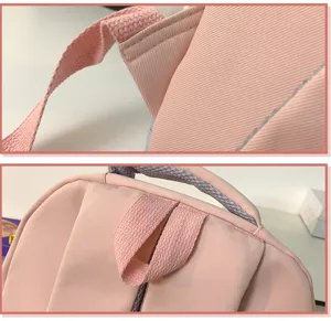 Rosa Mini Rucksack Detailansicht mit strapazierfähigen Gurten und verstärkten Nähten.