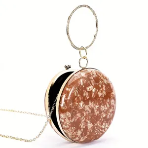 Schicke runde Abend-Clutch mit Strass-Ringgriff und goldener Metallrahmen für Damen.