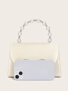 Elegante Satin-Abendtasche mit Perlen-Strass-Griff und Schleifendetail, perfekte Party-Clutch.