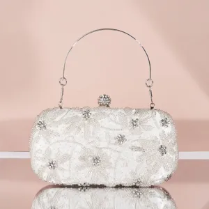 Elegante weiße Perlen-Abendtasche mit Metallgriff, ideal für Hochzeiten und elegante Partys.