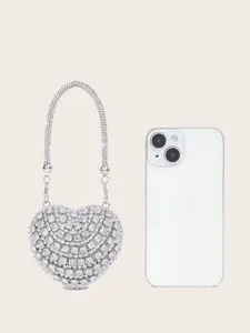Detailaufnahme der funkelnden Strass Herzhandtasche mit exquisiter Kristallverarbeitung.