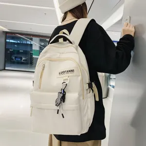 Sac à dos beige de style campus de grande capacité pour les étudiants et les déplacements quotidiens