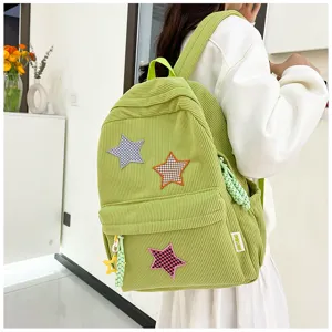 Green corduroy backpack with cute star patches, casual daypack for women and girls.