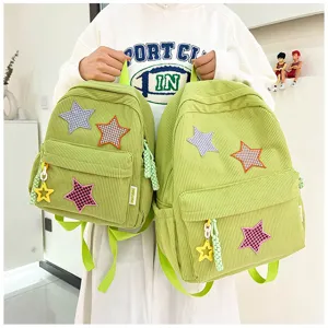 Japanese ins cute sweet girls mini corduroy backpack with star patches and pendants style.