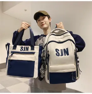 Two-piece school backpack and tote set in blue and white with bold SJN letter print.
