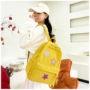 Cute yellow corduroy backpack with star patches, sweet casual small school bag for daily use.