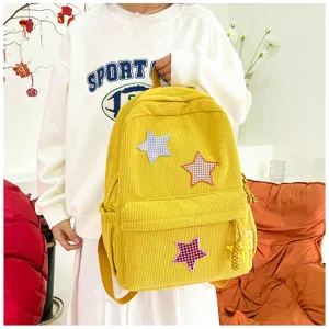 Japanese ins style yellow corduroy backpack with cute star patches for sweet girls.