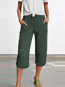 Casual solid color cotton linen cropped pants for women, loose fit with side pockets.