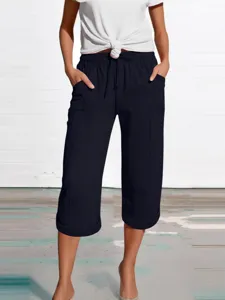 Casual loose cropped pants for women, solid color cotton linen capris with pockets.