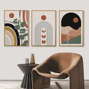 Bohemian abstract line wall art detail showing modern framed canvas prints in living room.