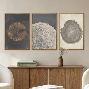 Ensemble de trois tableaux muraux abstraits encadrés en toile avec des anneaux d'arbres pour salon.