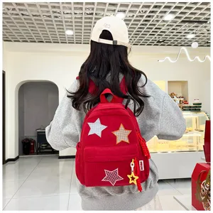 Cute Japanese style corduroy backpack with star patches for women and teen girls casual daily use.