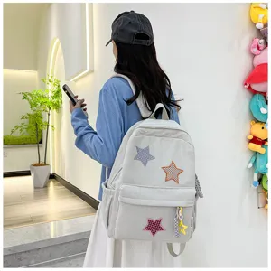 Japanese style cute corduroy backpack for girls with star patches, casual daily school bag.