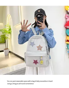 Grey corduroy backpack with cute star patches, casual daily school bag for sweet girls.