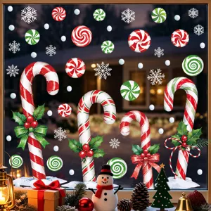 Detailed view of Christmas candy cane and snowflake window stickers creating a festive winter vibe.