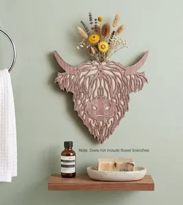Wooden highland cow head wall decor with hollow cutout design, perfect for rustic home decoration.