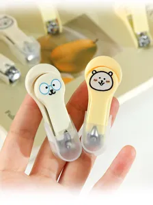 Coupe-ongles pliante de dessin animé mignon portable avec couvercle transparent.