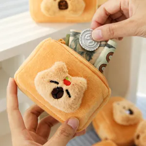 Cute plush coin purse with cute capybara face design, portable mini zipper storage bag.