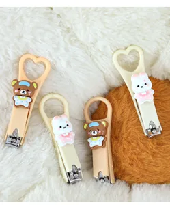 Cute cartoon nail clippers with heart handle, portable manicure tools, detailed shot.
