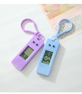 Detail view of portable student electronic hanging clocks with digital screen and keychain.