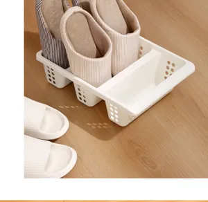 Plastic shoe storage box detail view, multi-compartment space-saving organizer for slippers.