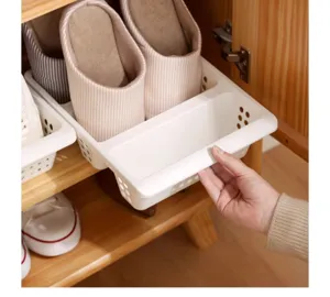 Plastic shoe storage box detail view, pull-out drawer organizer for space saving in cabinet.