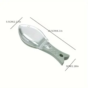 Close-up detail of the fish scale scraper with clear protective cover and ergonomic handle.