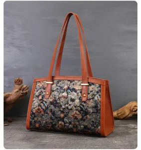 Exquisite floral embroidered shoulder bag for women, retro tote bag with brown leather trim.