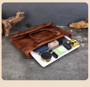 Leather bag detail view showcasing spacious interior capacity and premium retro texture.