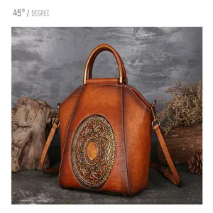 Close-up view of the vintage genuine leather embossed handbag showcasing intricate mandala details.