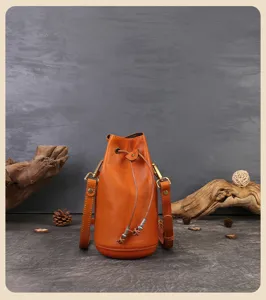 Handmade genuine leather bucket bag, retro vegetable-tanned cowhide crossbody shoulder bag.