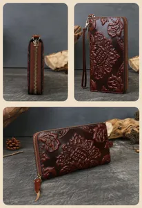 Genuine leather vintage embossed wallet with wrist strap and zipper closure for women detail view.