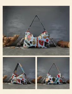 Detailed view of vintage patchwork leather shoulder bag with unique color block design and straps.