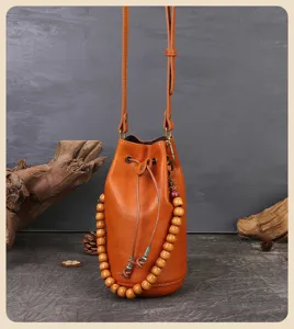 Handmade vegetable-tanned leather bucket bag retro drawstring shoulder bag for women mini