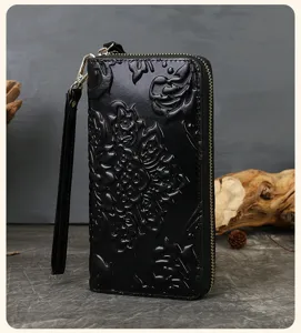 Women's genuine leather embossed long wallet with wrist strap, retro black fashion coin purse.